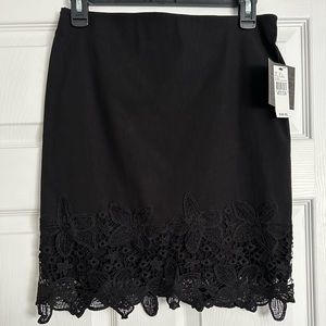 Black pencil skirt with Lace. Size Medium. New with tags, never worn.